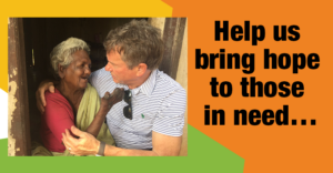 embrace a village founder Joe Clendenny embraces a woman with leprosy