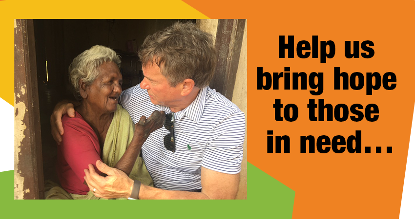 embrace a village founder Joe Clendenny embraces a woman with leprosy